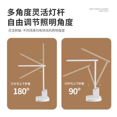 China Plastic High quality foldable portable led multi-kinetic adjustable table lamp pen with canister storage function for sale