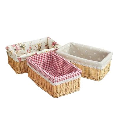 China Small Willow Sustainable Decorative Rectangular Baby Clothing Wicker Storage Basket With Fabric Lining for sale