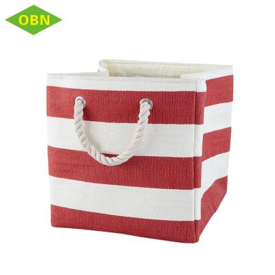 China New Viable Handmade Striped Large Outdoor Folding Fabric Picnic Basket Paper Straw Storage Basket for sale