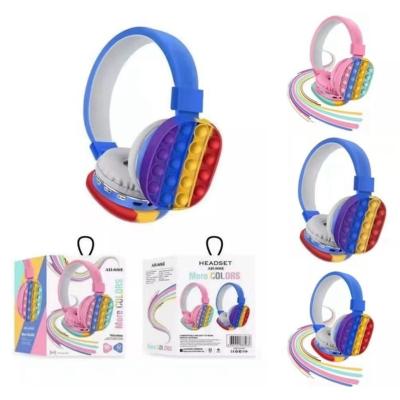 China Perfect Pop 2021 New Colorful Silicone Popping Relieve Stress Toys Popit Wireless Headphones for sale