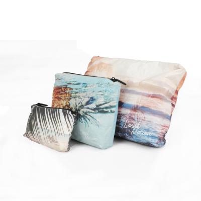 China Dongguan Recyclable Manufacture Customize Lightweight Toiletries Grab Tyvek Office Soft Paper Bag Paper Dupont Bag Cosmetic Storage Bag for sale