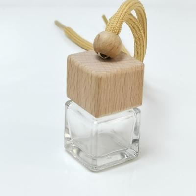 China Wholesale Wooden Bottle 5ml 6ml Aromatherapy Perfume Small Designer 7ml Fragrance Car Air Freshener Car Perfume for sale