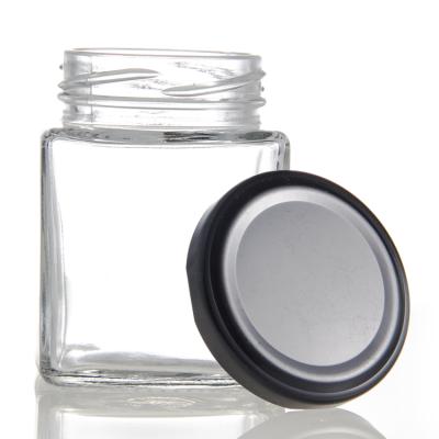 China Wholesale Empty Custom Clear Glass Honey Bottle Jam Storage Container Food Freshness Preservation Wholesale Square Jar With Screw Lid for sale