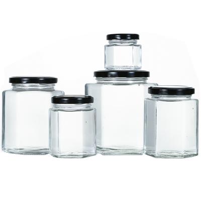 China New Empty Glass Honey Packaging Jar Hexagon Honey Glass Bottle Food Jar Frascos De Vidrio Para Style Food Storage Containers for sale