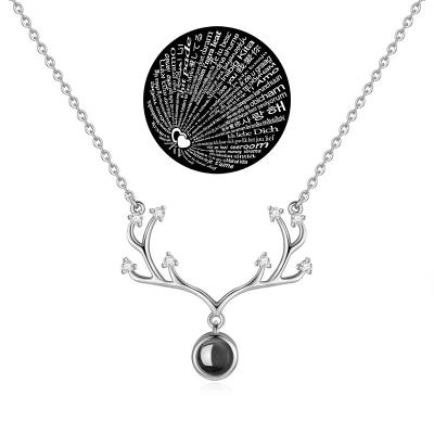 China TRENDY 925 Sterling Silver 3A Nicholas Antler 100 Tongues I Love You Projection Necklace for sale