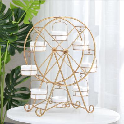 China New Arrive Metal Ferris Wheel Cake Stand Wedding Ferris Wheel Dessert Stand Wedding Table Creativity Roman Centerpiece for sale