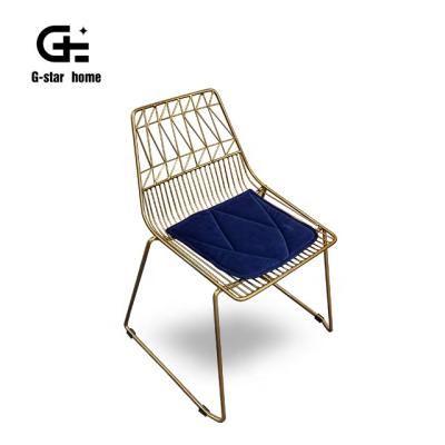 China Gold Finish Modern Styling Stackable Dining Chair For Outdoor Dining Cafe Metal Wire Chair for sale