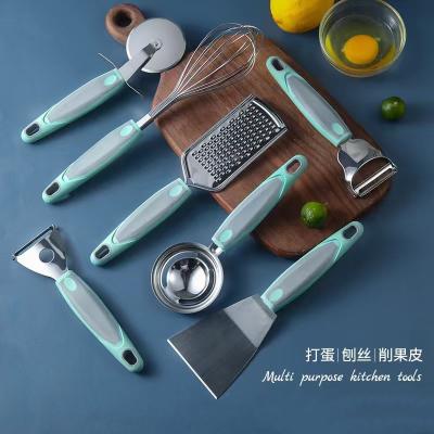 China Viable Kitchen Instrument Set Grater Cheese Peeler Beater Garlic Press Can Opener Ice Cream Scoop Pizza Cutter 2021 New Kitchen Accessories for sale