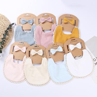 China New fashion baby saliva towel headband set solid color bamboo fiber cotton children's bib baby saliva bib set and bow headband for sale