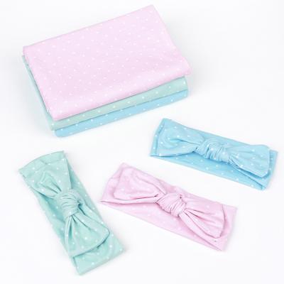 China Hot Selling Breathable Baby Cotton Wrap Cloth Baby Solid Color Dot Wrapped Comforter Wrapped Blanket and Headband Set for sale