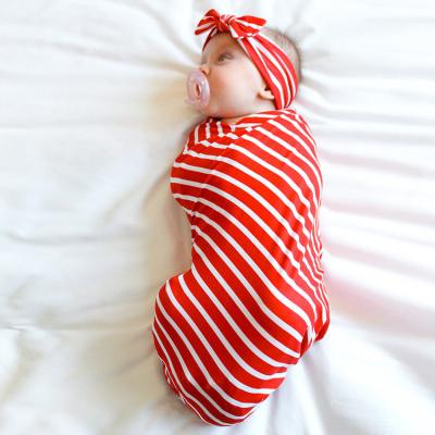 China Red Striped Wrapping Baby Wrapping Breathable Towel Bow Headband Set Newborn Baby Wrapping Cloth Blanket for sale