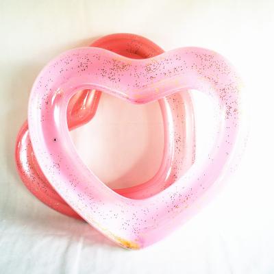 China Water Fun Sets Manufacturers Wholesale Heart Shaped Adult Inflatable Pool Float PVC Swim Rings Eco-Friendly for sale