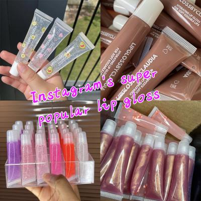 China Waterproof 122 colors custom logo lipstick flavored glitter lip gloss base lip gloss private label vegan vinyl labels for lip gloss for sale