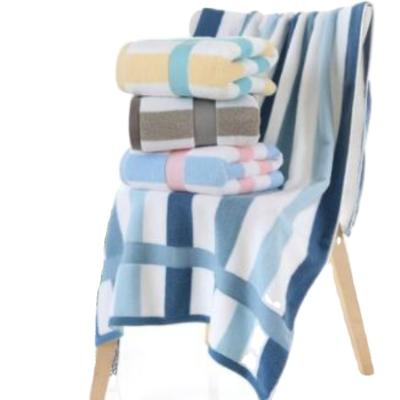 China New style 700g 90*180cm striped pure cotton towel cotton compressed color beach towel lengthened and enlarged bath for sale