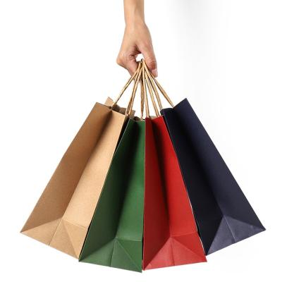 China Recycled Materials Costom Logo Cheap Price Kraft Paper Gift Luxury Custom Printed Shopping Paper Bag With Handle for sale