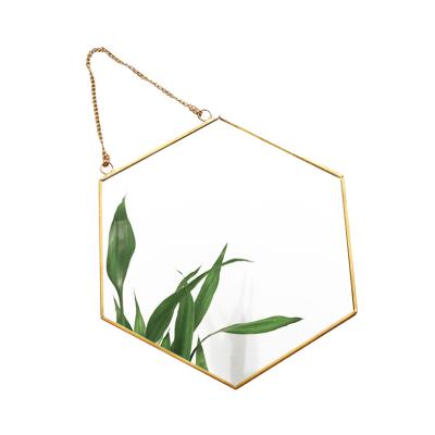 China Easy to Clean Modern Hexagons Classic Wall Mirrors Living Room Gold Frame Metal Wall Mirror for sale