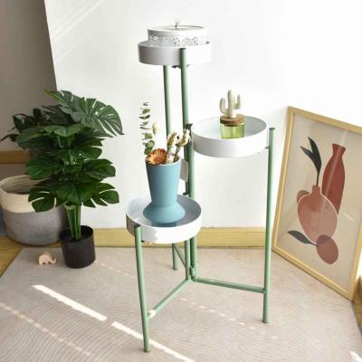 China Corrosion Resistance Rotating Plant Stands Indoor Outdoor Metal 3 Tier Steel Planter Support Planter Shelf for sale