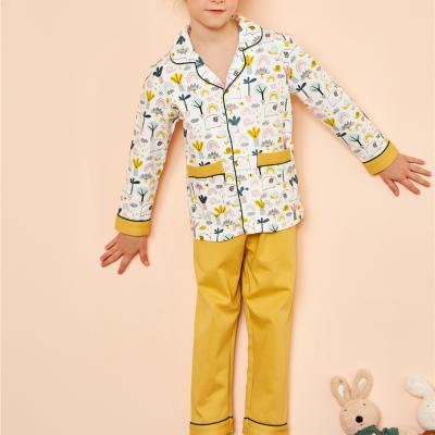 China Hot selling children's breathable clothing child suit solid color cardigan pajamas printed home clothes for sale