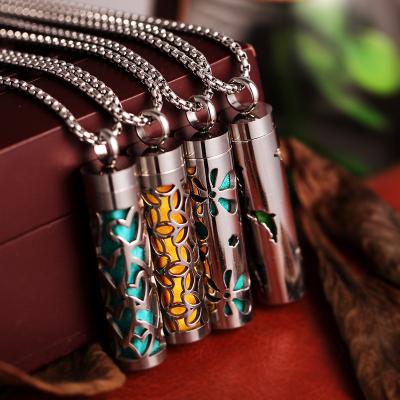 China CLASSIC Cylindrical Perfume Necklace Stainless Steel Diffuser Essential Oil Pendant Vintage Hollow Out Pendant Perfume Bottle Necklace for sale