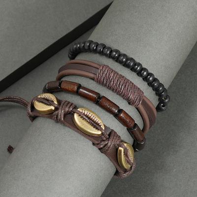 China 2022 TRENDY Fashion Vintage Stack Multilayer Bracelets Sets Man Metal Shell 4pcs / Wooden Bead Bracelet Set Braided Wrap Leather Bracelets for sale