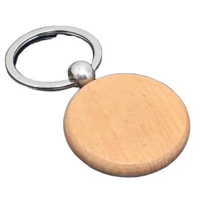 China Wholesale Cheap High Quality Custom Promontion Gift Shape Carve Pattern Word Logo Key Chain Natural Color Wooden Keychain for sale