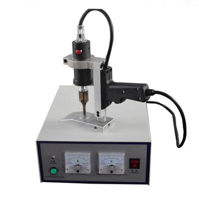 China Handheld Ultrasonic Cutting Fabric Textile Cutting Machine for sale