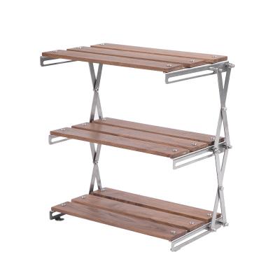 China TOPWIND Height Adjustable Outdoor Lightweight Multifunctional Picnic Portable Object Setting Rack Camping Shelf Folding Dining Table for sale