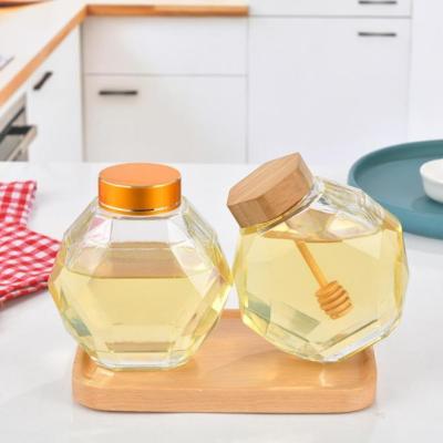 China Eco-friendly 200ml 380ml 700ml Geometric Unique Empty Hexagonal Honey Jar Glass Creative With Wood Or Metal Lid for sale