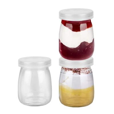 China Eco - Friendly Empty Clear Glass Maker 100ml 150ml 200ml Pudding Yogurt Jars With Lid for sale