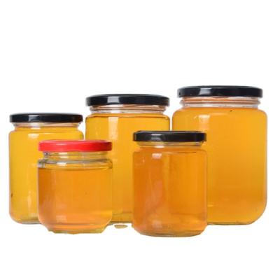 China Eco - Friendly Clear Round Shape Glass Honey Food Storage Jar With Metal Lid for sale