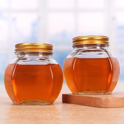 China High Quality Eco-friendly 500g 1000g 380ml 730ml Hexagon Clear Honey Hex Glass Jar With Metal Lid for sale