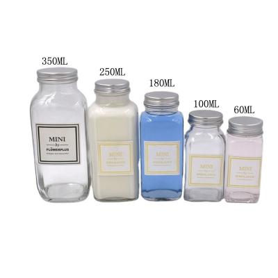 China Square 60ml 120ml 250ml 350ml 500ml Eco-friendly French Glass Juice Bottles Packaging For Beverage for sale