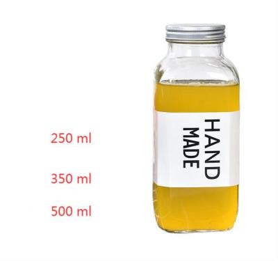 China 250ml 350ml 500ml Pharmaceutical French Square Empty Beverage Milk Beverage Clear Bottle Food Grade Drinking Glass Bottle With Screw Lid for sale