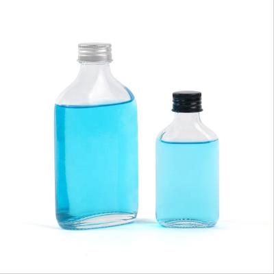 China Glass Water Bottle 350ml 500ml Clear Reusable Beverage Flask Shape For Liquor Logo Glass Juice Bottles Custom Made for sale