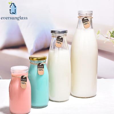 China Water Beverage Milk Bottles And Beverage Packaging 250ml High Temperature Yogurt Glass Bottles for sale