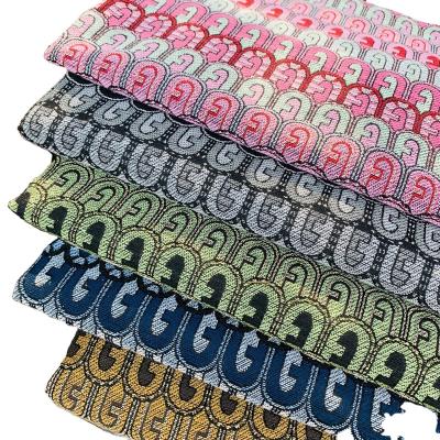 China Abrasion-Resistant Domestic Hot sale handbag bag green high density geometric jacquard fabric Factory direct sales for sale