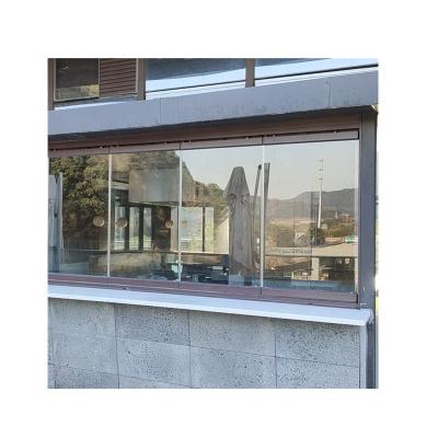 China Fashionable Waterproof Frameless Patio Deck Sunroom Exterior Glass Door Sliding Folding Glass Curtain for sale