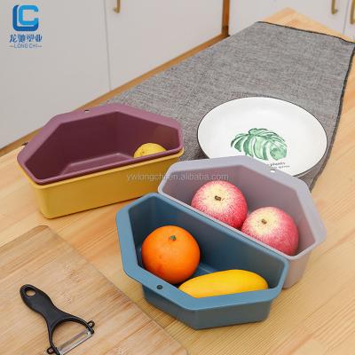 China Multifunctional Plastic Stocked Bilateral Triangle Kitchen Sink Sponge Drain Storage Basket With Suction Hook for sale