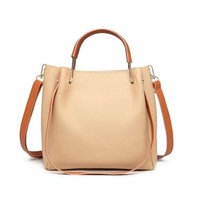 China Fashion high quality pure color purse simple bucket bag women leisure dingled houlder bags for female Top-handle hand totes for sale