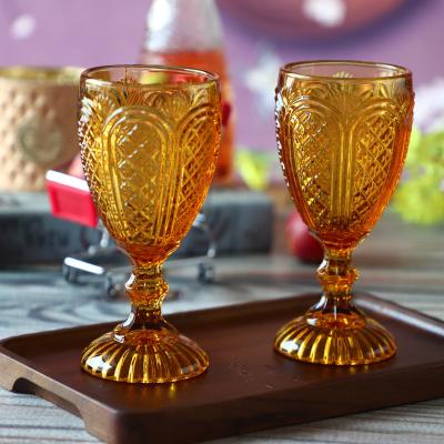 China Cheap Wine Glasses Amber Vintage Colored Goblets Glass Factory Machine Embossed Water Cup Glass Stem Red Wine Glass For Wedding for sale