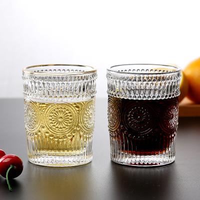 China Christmas Sunflower Stemless INS Milk Tumbler Glass Wine Glass Traditional Cheap Vintage Juice Drinking Glass Cup Embossed for sale