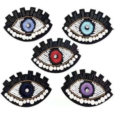 China Fashionfashion Elegant And High End Price Good Quality Eye Embroidered Small Beaded Stone Patch for sale