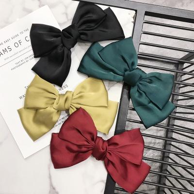 China Eco-friendly Popular Wholesale Cute Color Cloth Bow Hair Clip Hair Clip Accessories Ins 10 Big For Ladies Hair Clips for sale