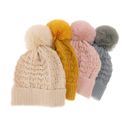 China COMMON Thick Slouchy Pink Winter Pompom Beanie Knitted Hats With Warm Snow Knit Beanie Custom Skull Ski Cap For Women for sale