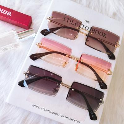 China 2021 Summer Anti UV400 Rimless Gradient Women Eyewear Fashion Ladies Small Square Rectangle Sunglasses for sale