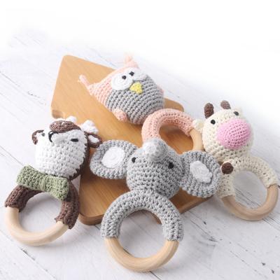 China Soft Animal Ring Baby Crochet Teether Cotton Wooden Toy Wholesale Wood Crafts Cute Knitted Baby Teether Toy Baby Rattle Teether for sale