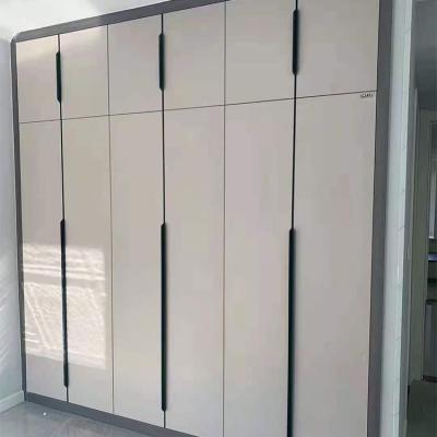 China Luxury Customized Dressing Room Wardrobe Modular Cabinet System Sintered Bed Stone Bedroom Clothes Almirah Aluminum Alloy for sale