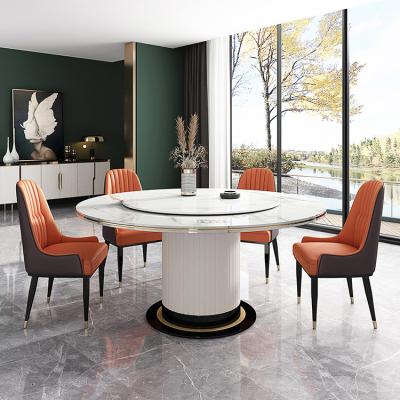 China Rotatable Modern White Glass 8MM Electric Revolving Dining Table With 6 Seater Set Tempered Glass Table Top Stainless Steel Base for sale