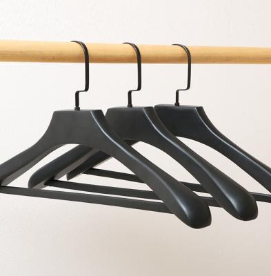 China Wholesale CLASSIC Smooth Surface Black Wooden Suit Hangers, High End Display Wooden Hangers For Clothes for sale