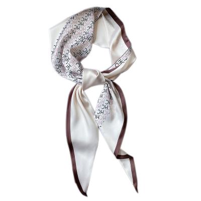 China Letter Decorative Thin Silk Female Fashion Long New Small Scarf Professional Scarf Tying Bag With Hair Band Scarf for sale